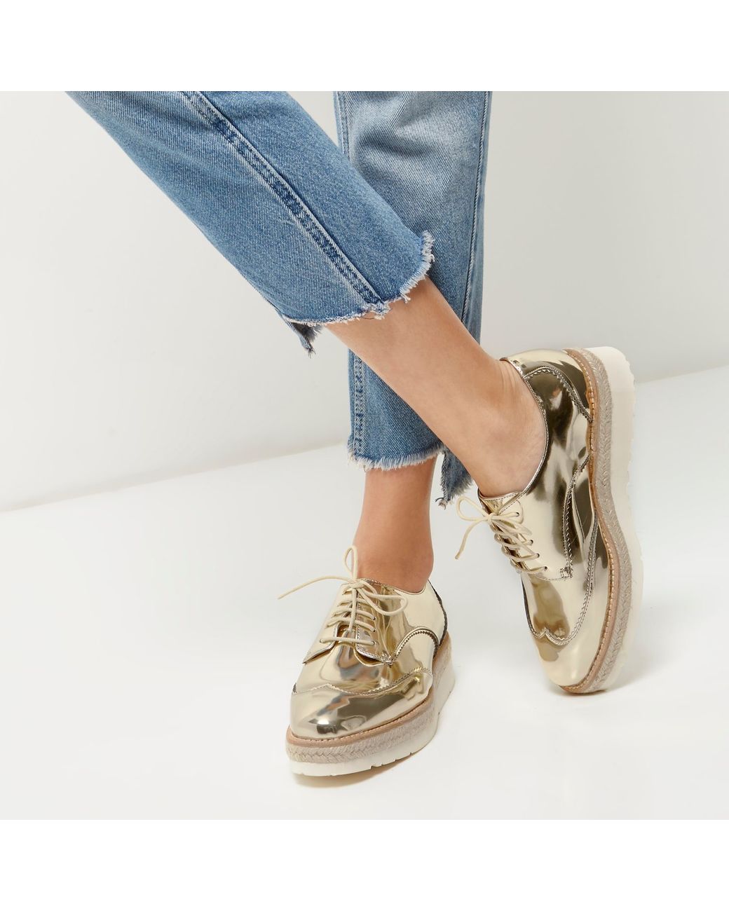gold platform brogues