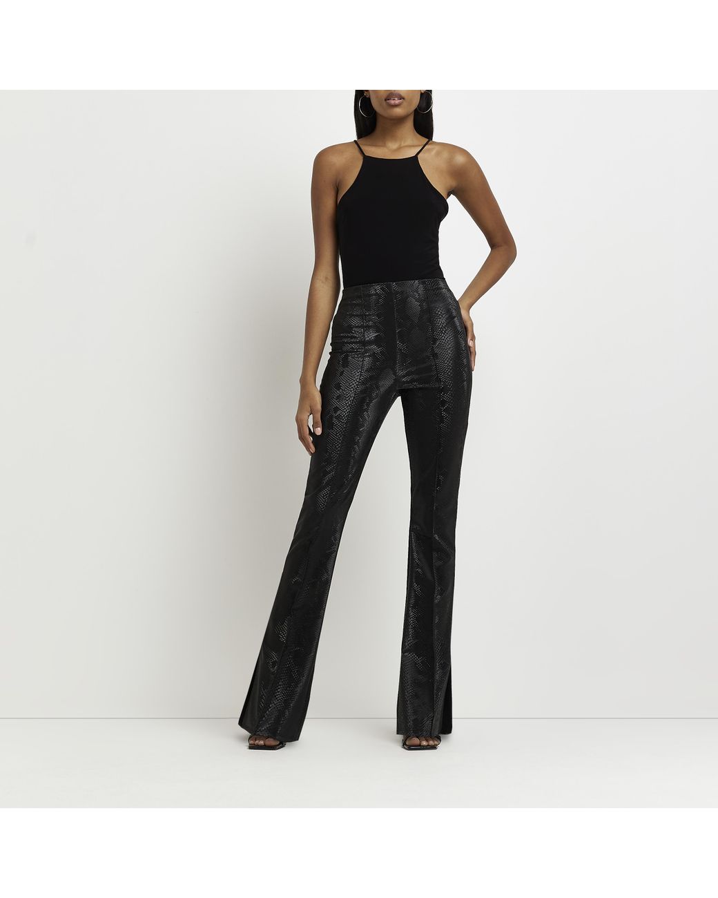 River Island Animal Print Coated Flared Trousers in Black | Lyst UK
