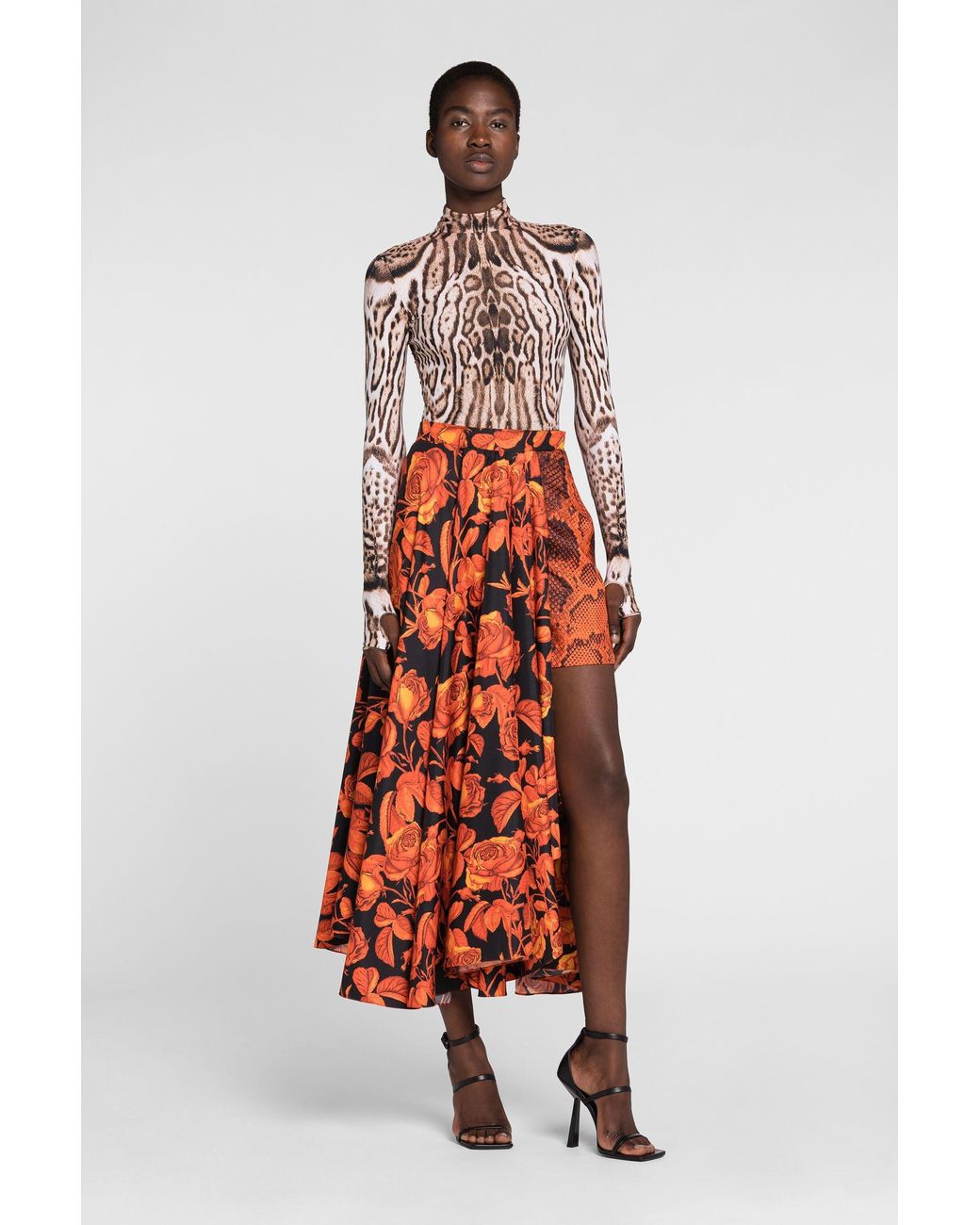 Falda Asimétrica Con Estampados Rose Y Python Roberto Cavalli de color Orange
