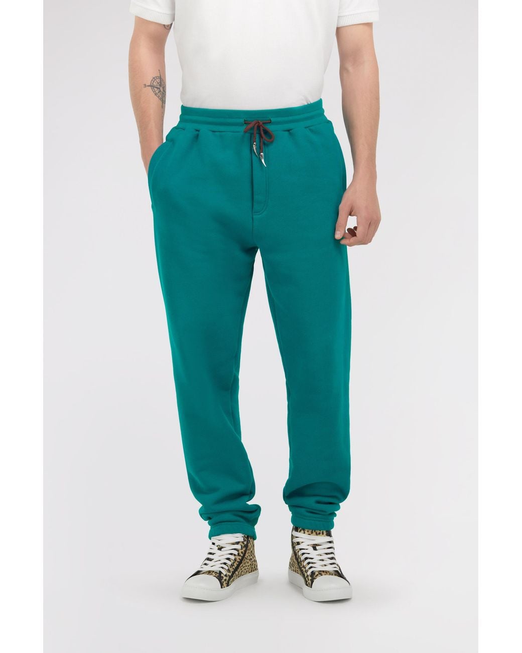 Roberto Cavalli Green Trousers With Fang Detail for men
