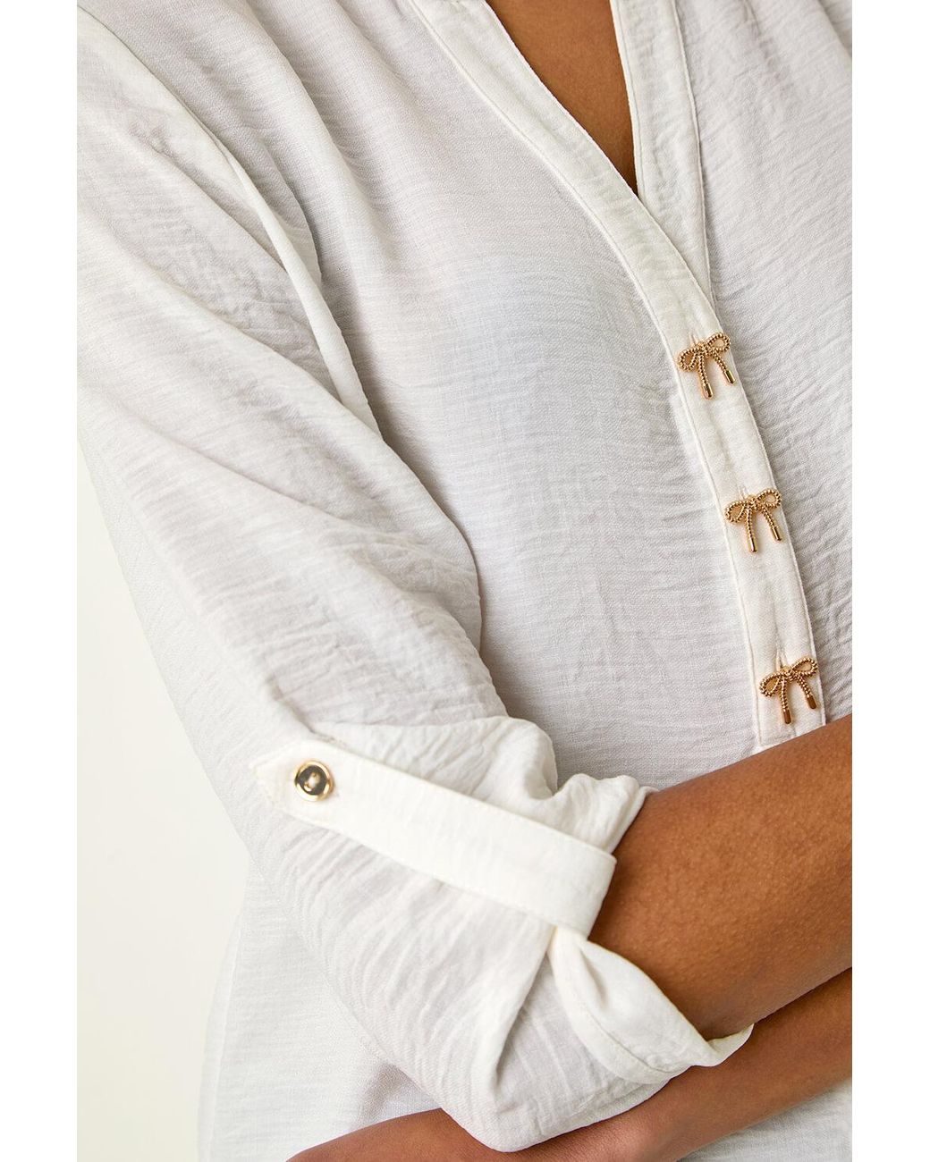 Roman White Longline Bow Button Top