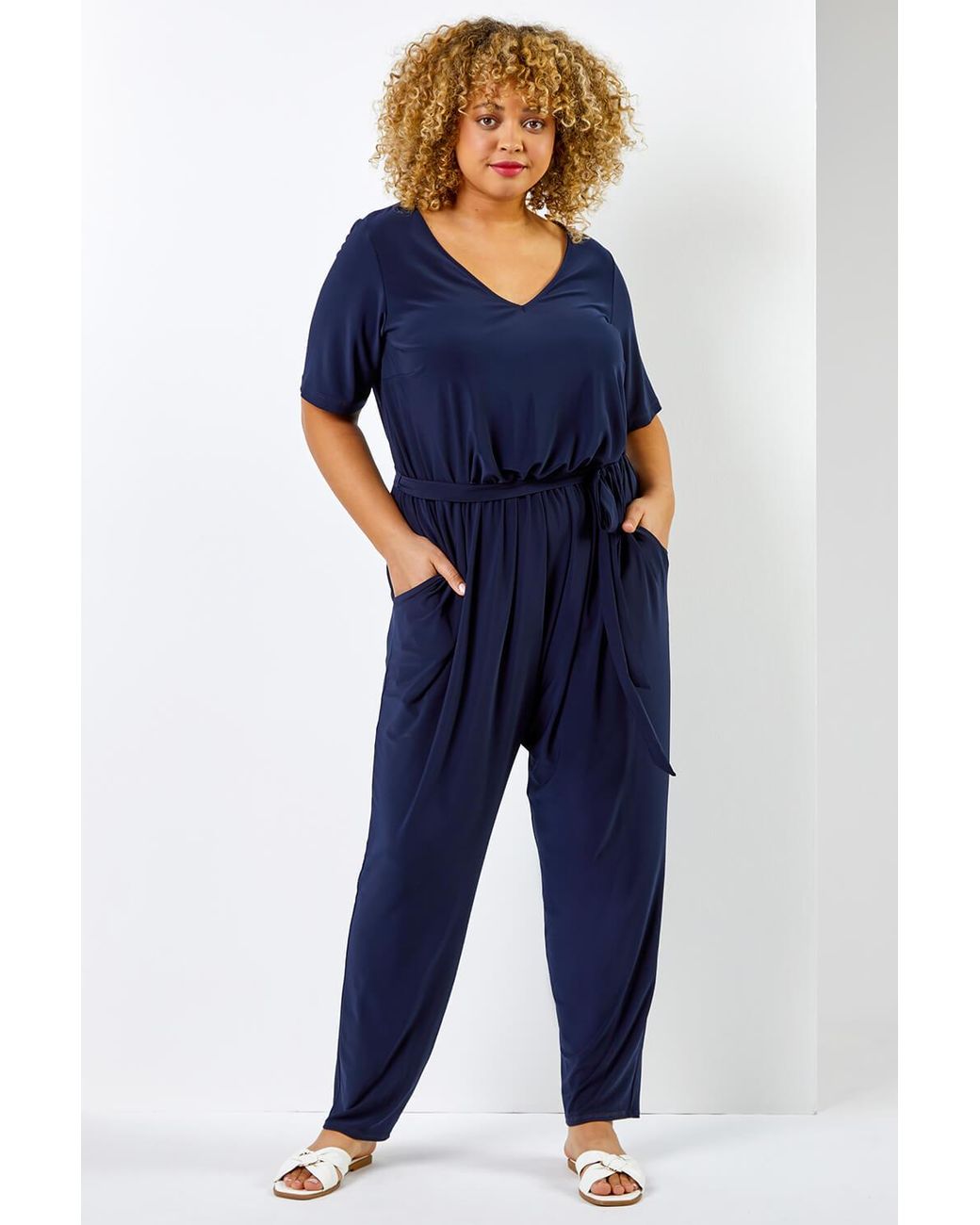 Roman Curve Blue Tie Waist Jersey Jumpsuit