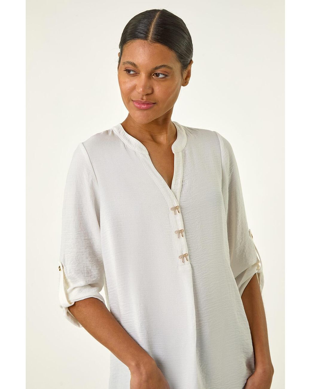 Roman White Longline Bow Button Top