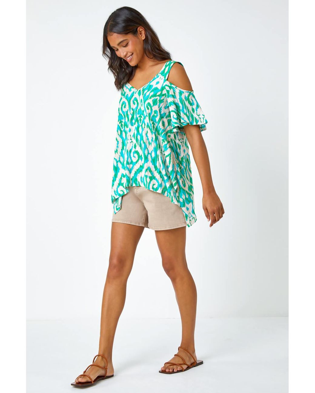 Roman Blue Aztec V-Neck Cold Shoulder Hanky Hem Top