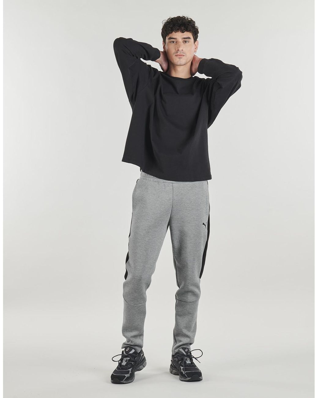 PUMA Gray Tracksuit Bottoms Evostripe Core Pants for men