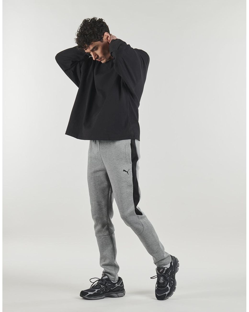 PUMA Gray Tracksuit Bottoms Evostripe Core Pants for men