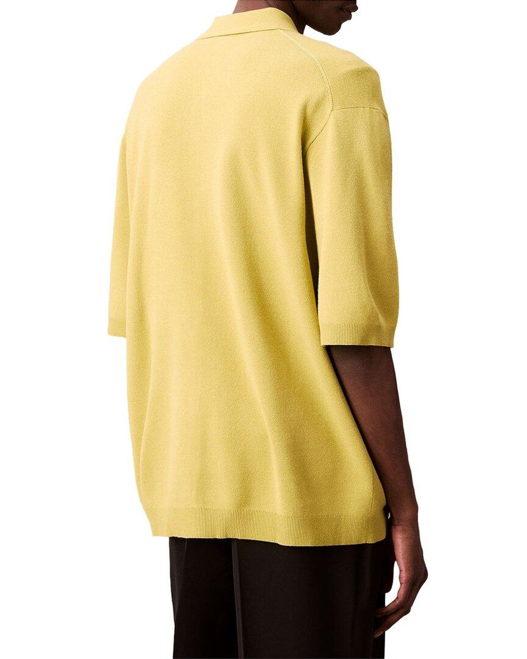 Calvin Klein Yellow Snowy Tech Knit Polo Sweater for men