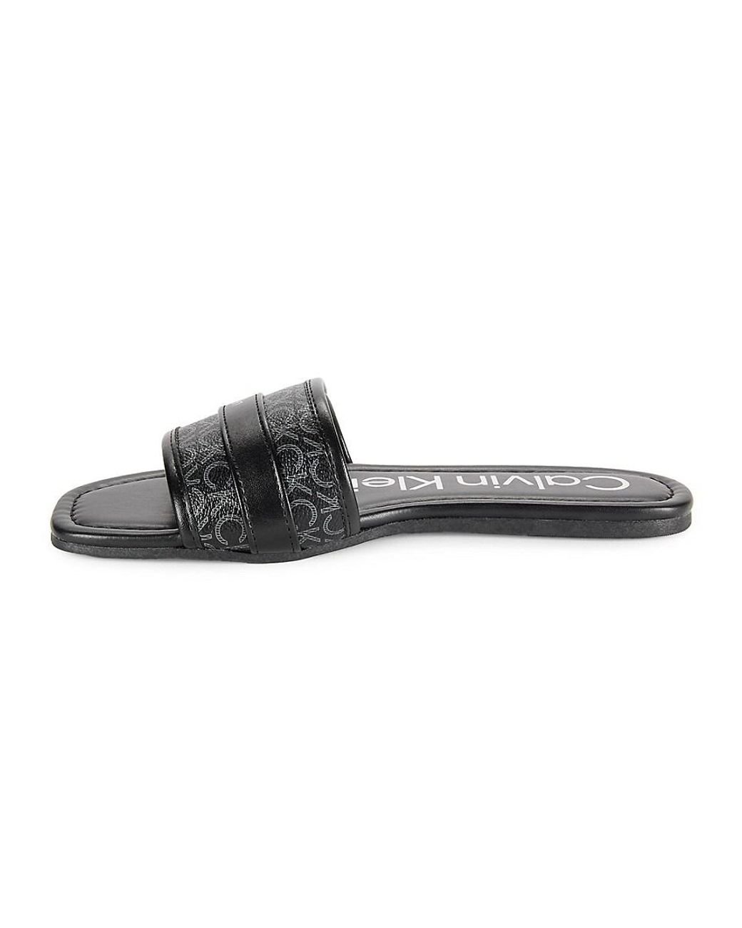 Calvin Klein Bonica Monogram Flat Sandals in Black Lyst