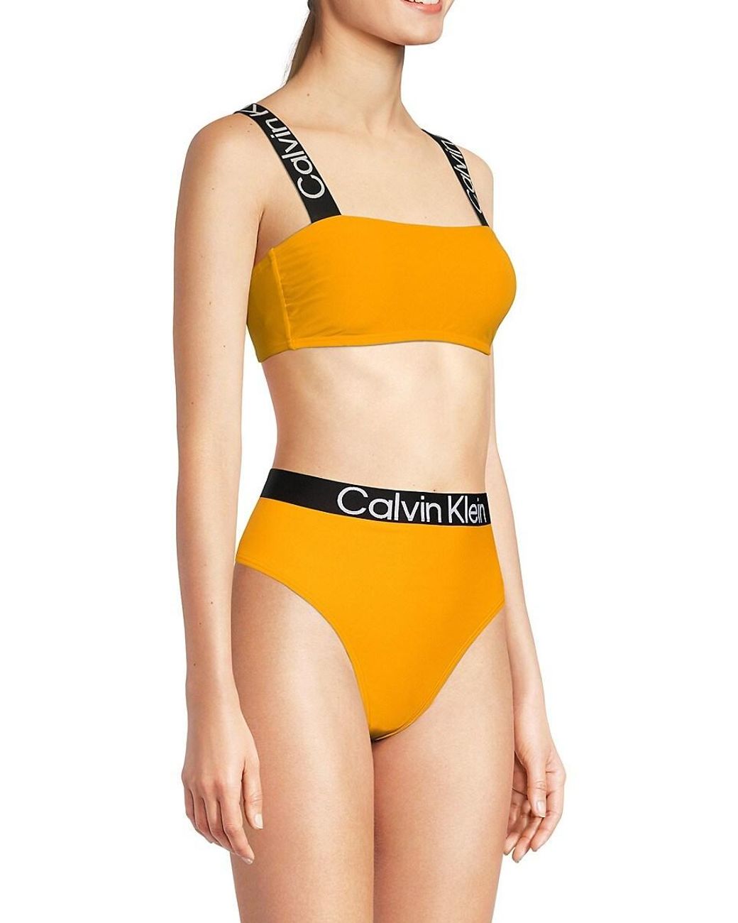 Calvin Klein Logo Shoulder Strap Sports Bra in Orange | Lyst UK