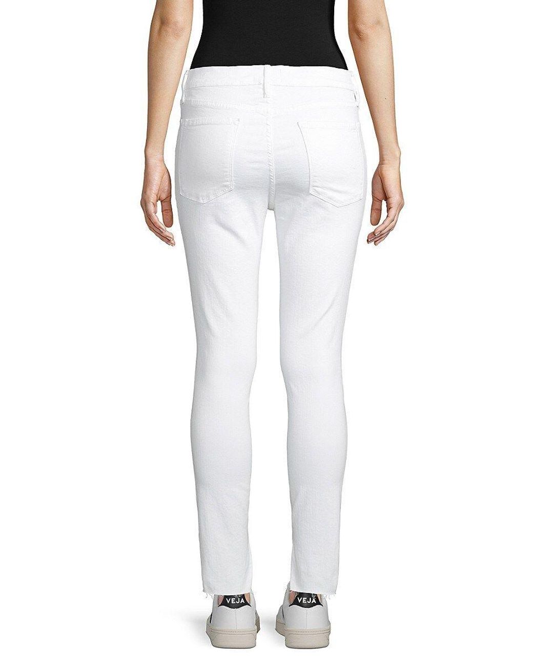 Frame white store skinny jeans