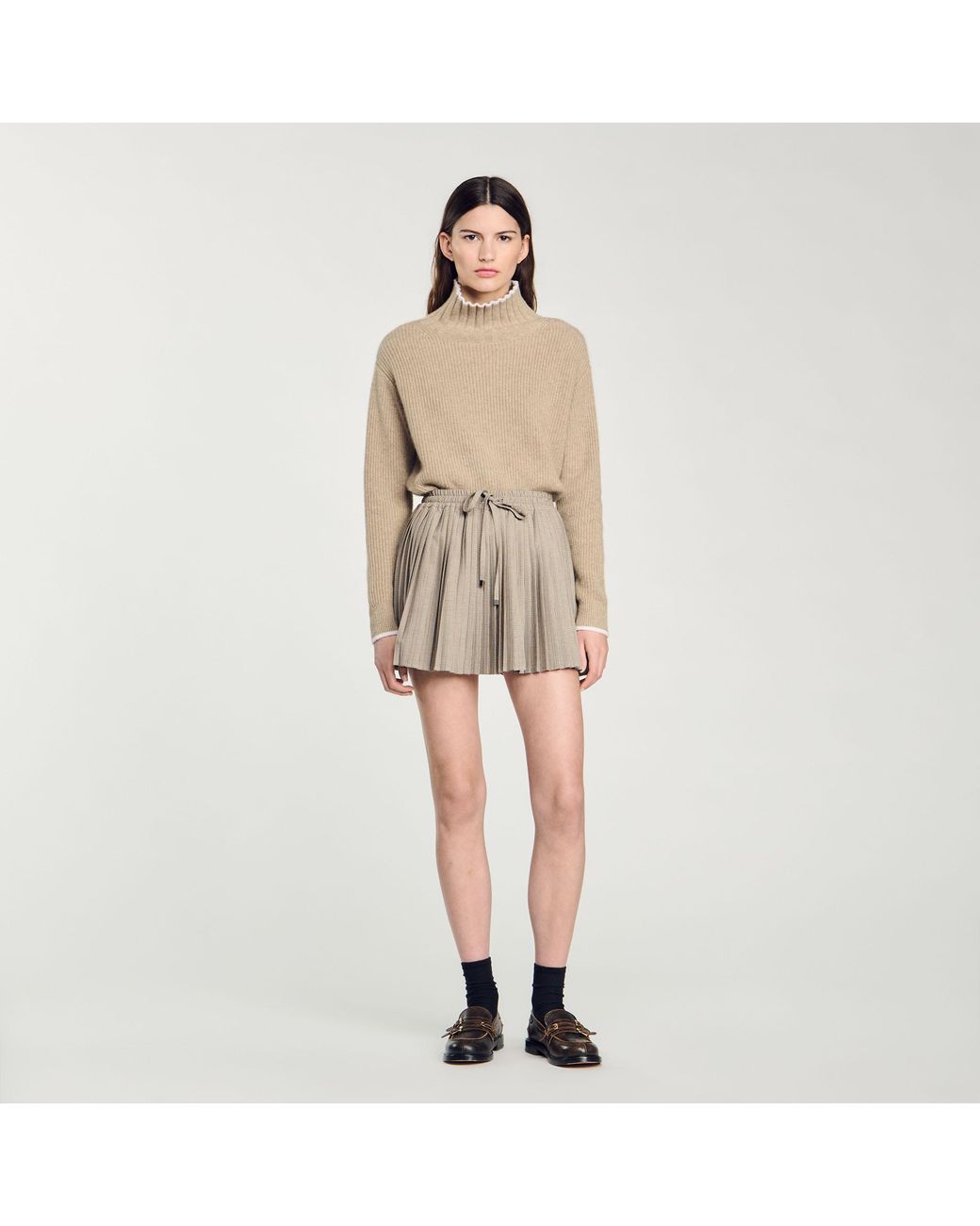Jupe courte plissee Sandro en coloris Noir Lyst