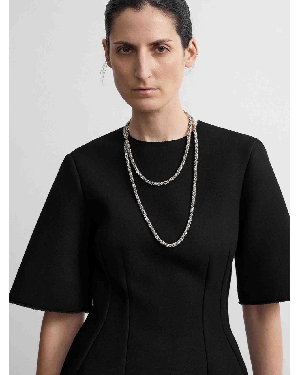 Totême Black Sculptural Short Sleeve Top
