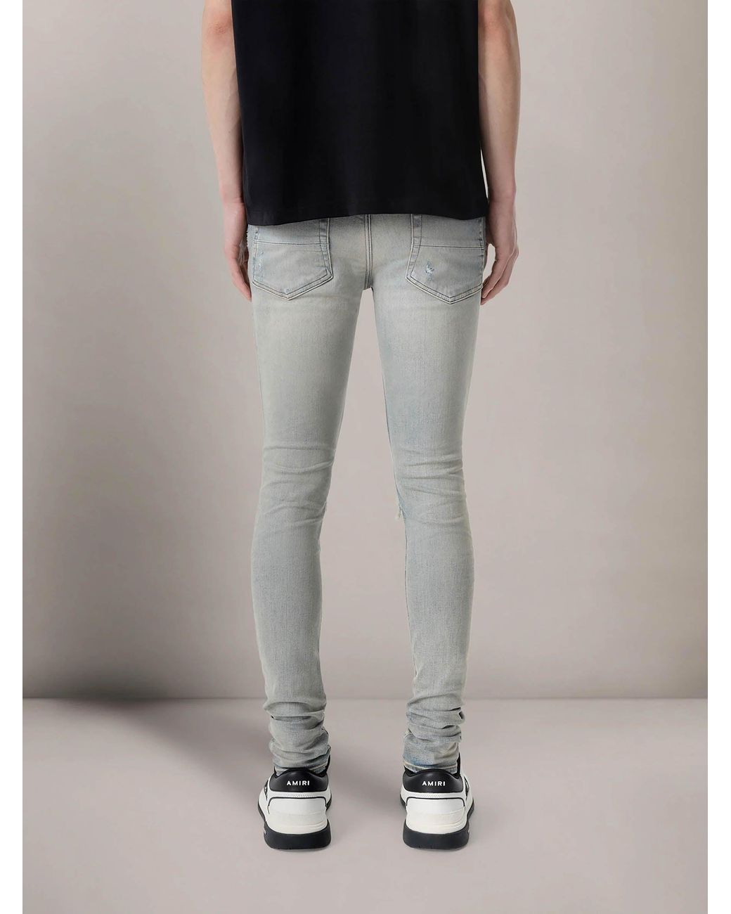 Amiri Blue Ripped Slim Jeans for men