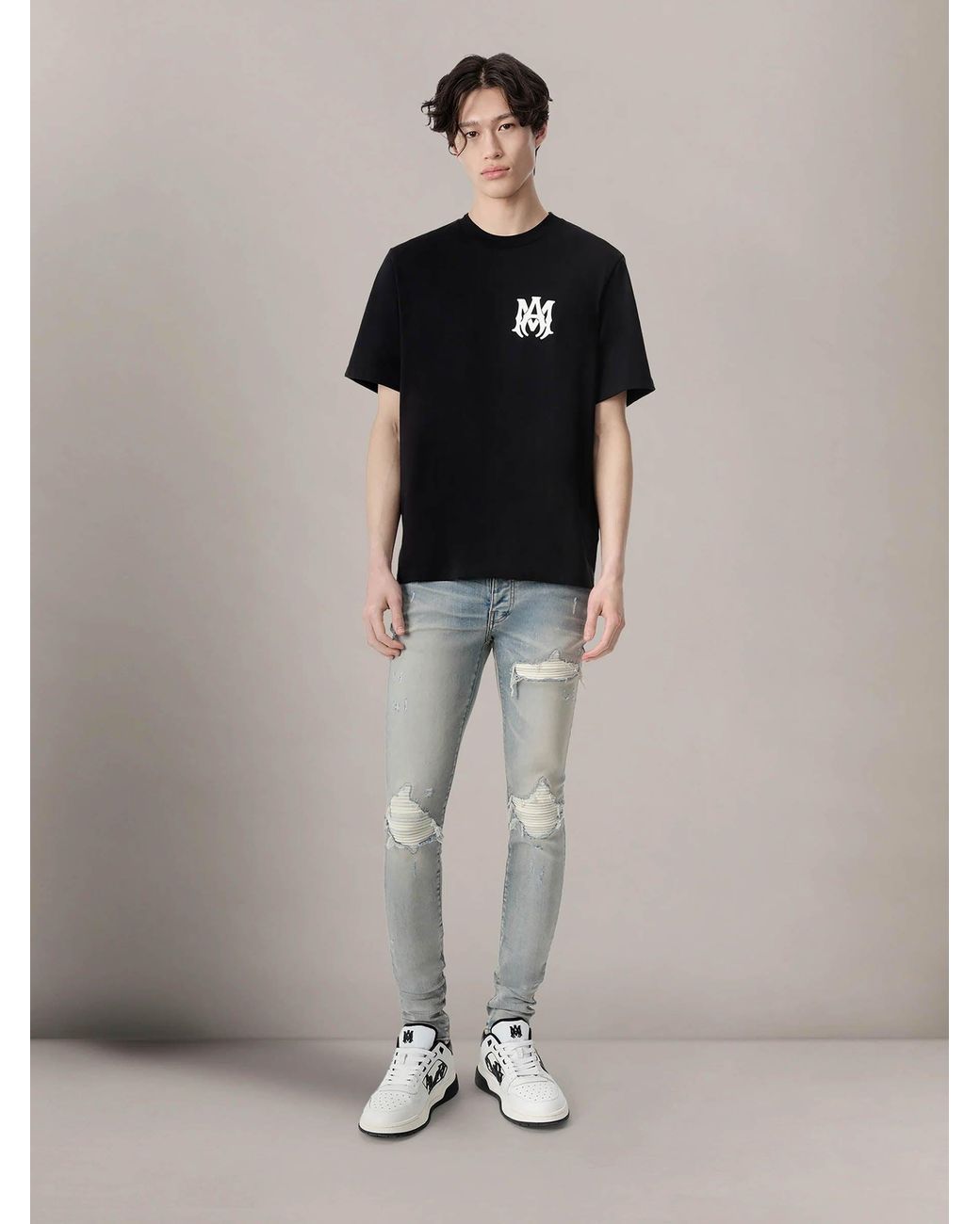 Amiri Blue Ripped Slim Jeans for men