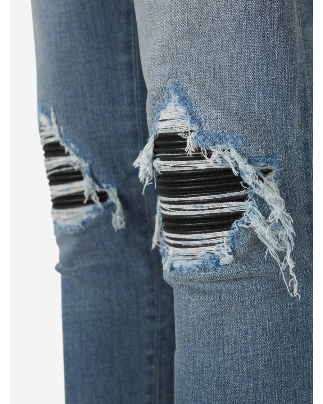 Amiri Blue Ripped Slim Jeans for men