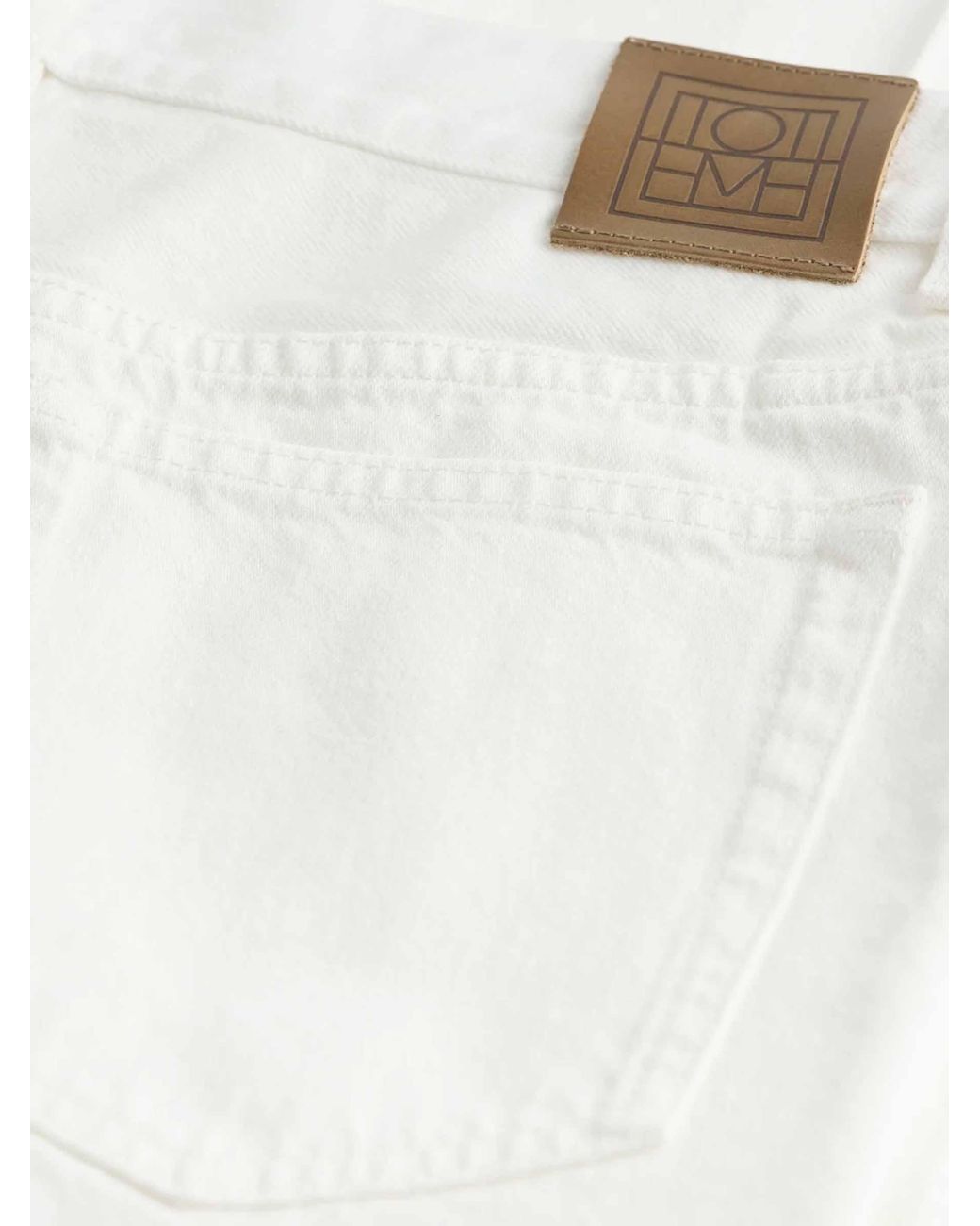 Totême  White Plain Flared Jeans