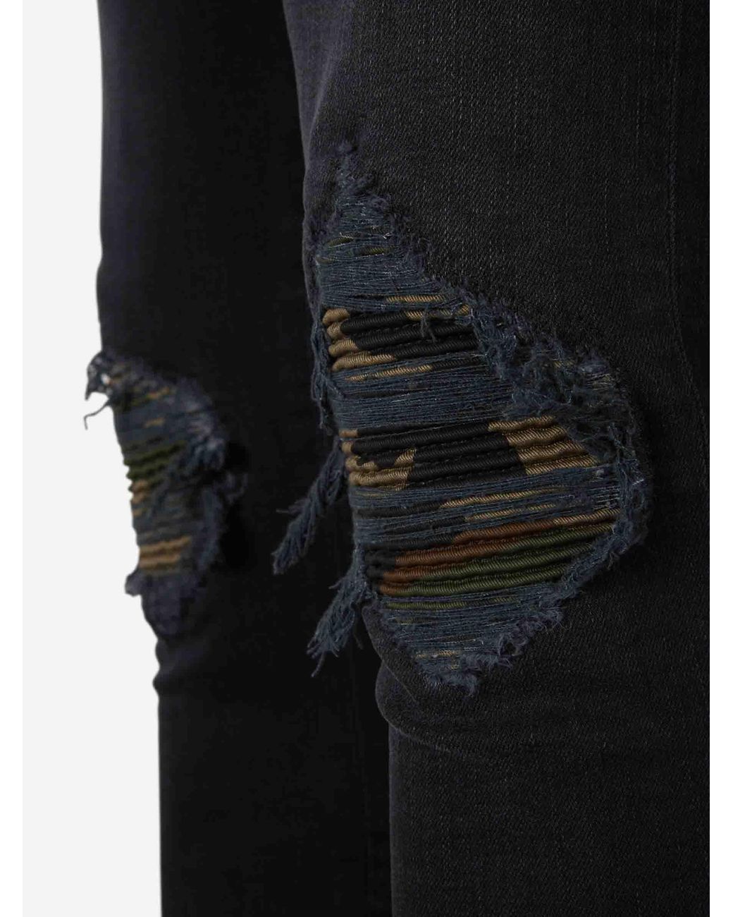 Amiri Blue Ripped Skinny Jeans for men