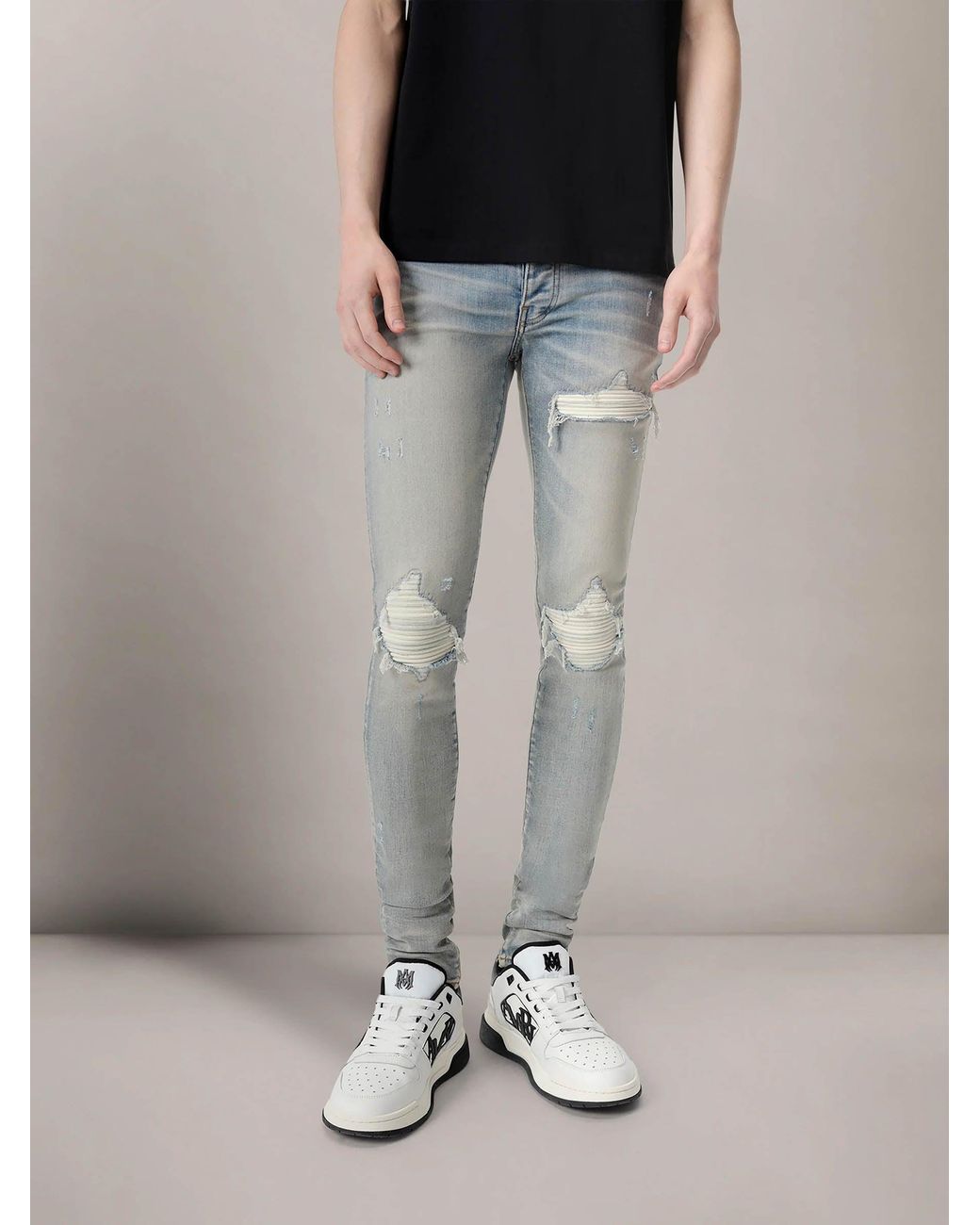 Amiri Blue Ripped Slim Jeans for men