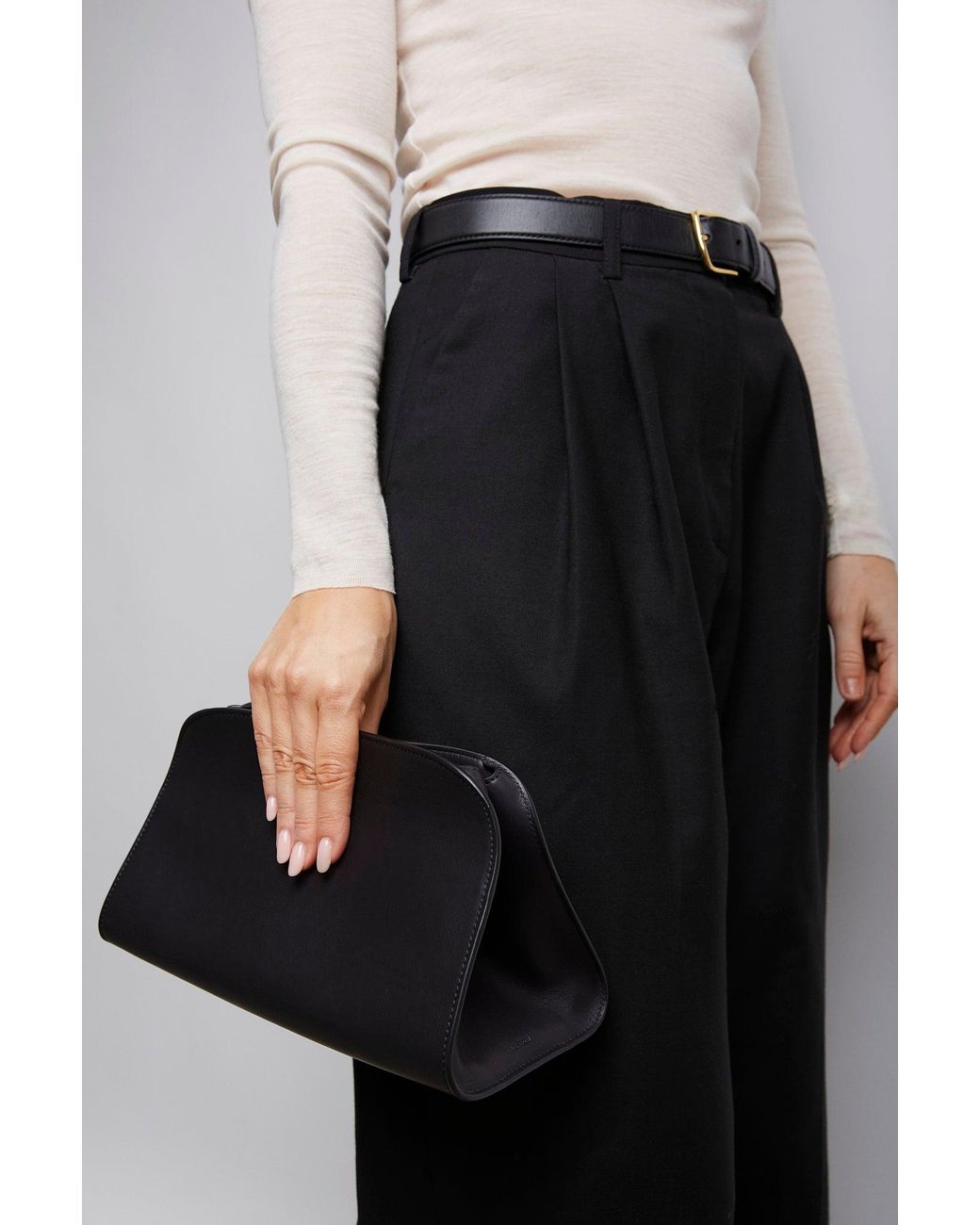 The Row Peggy Black Leather Clutch