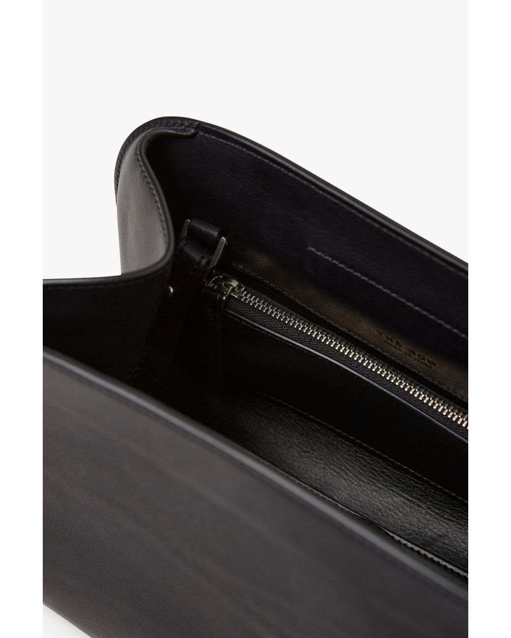 The Row Peggy Black Leather Clutch