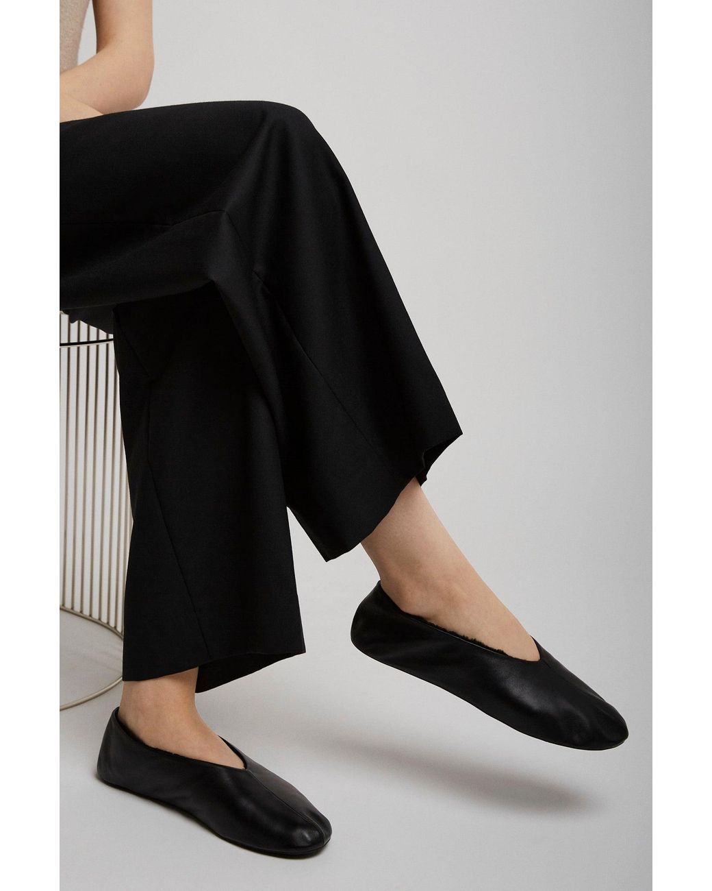 The Row White Stella Black Shearling Flats