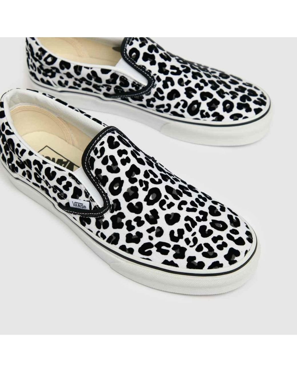 Vans White & Black Snow Leopard Slip Trainers | Lyst UK