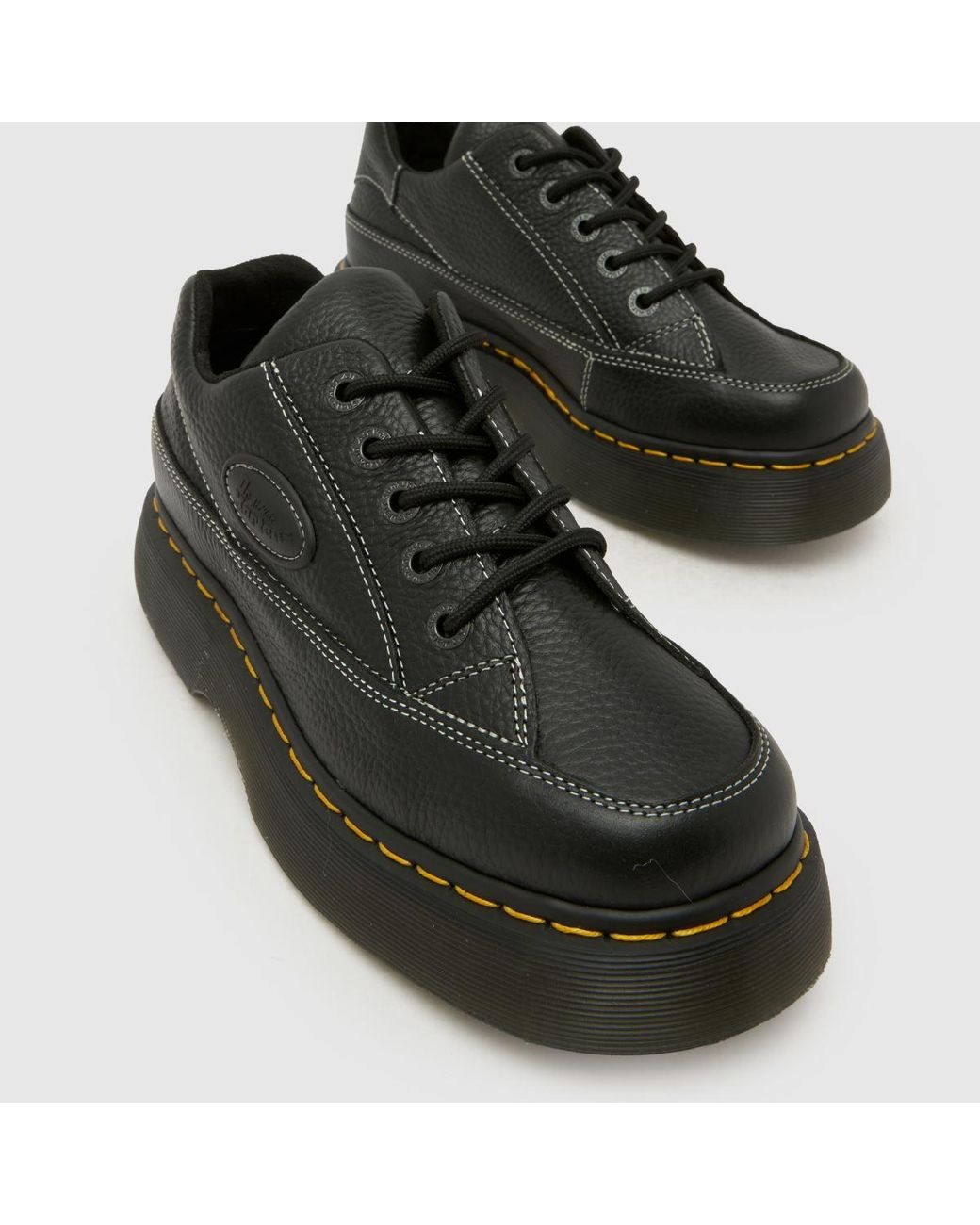 Dr. Martens Black Buzz Flats
