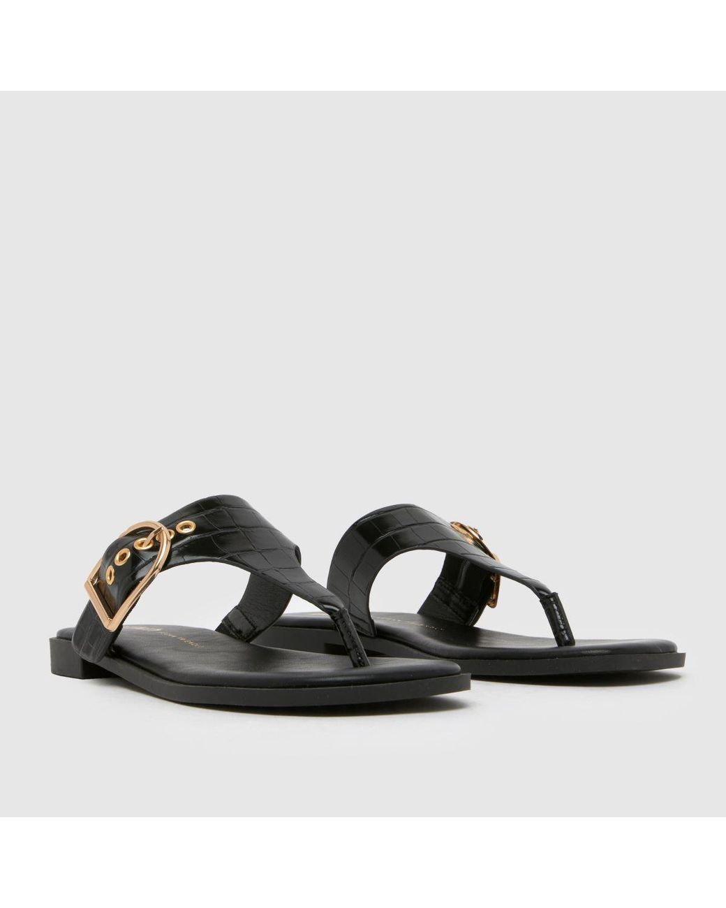 Schuh Black Teena Buckle Toe Post Sandals