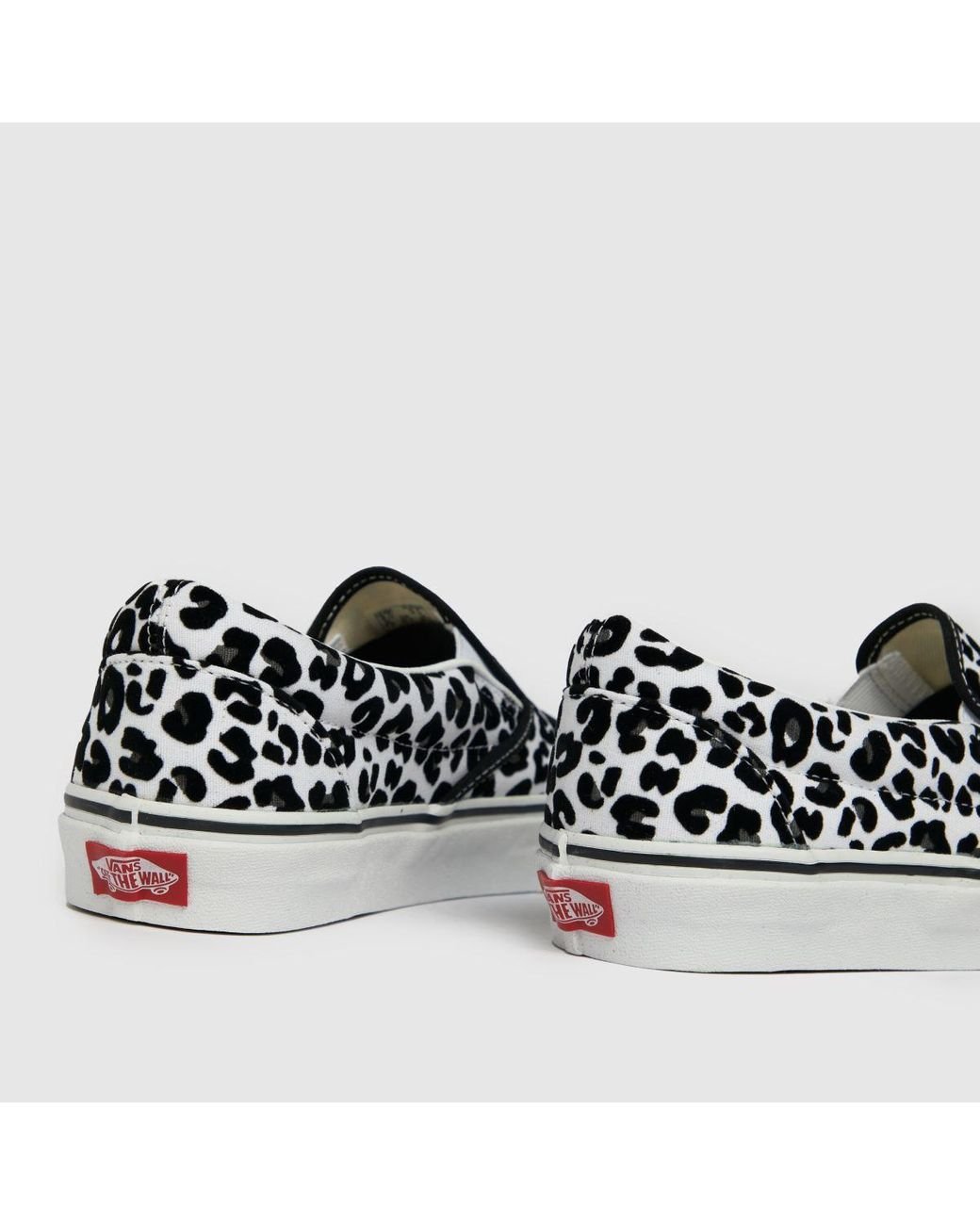 Vans White Black Snow Leopard Slip Trainers Lyst UK