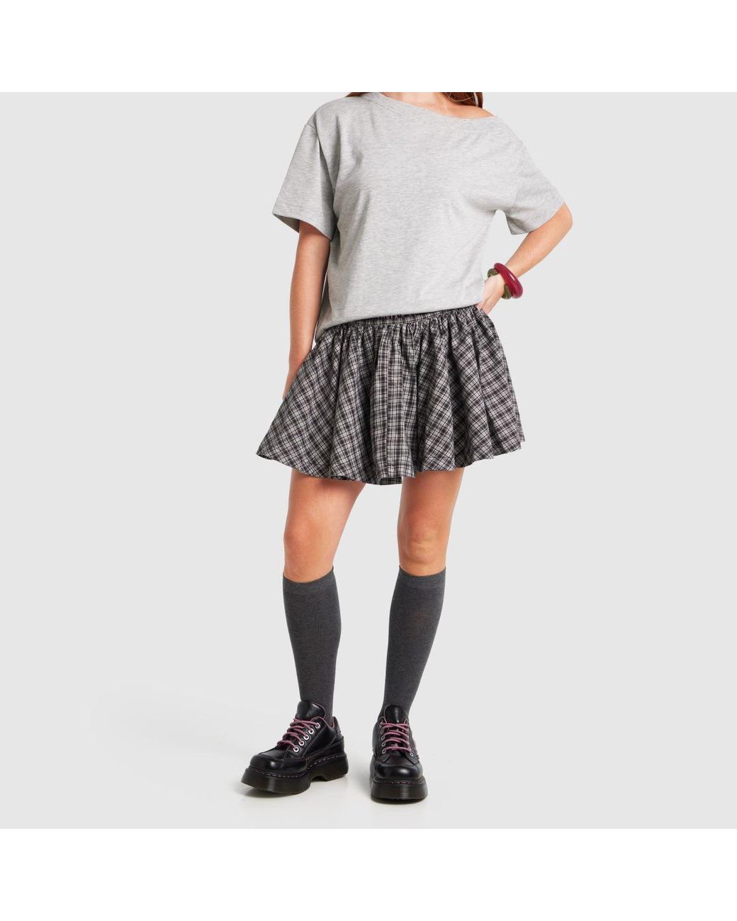 Dr. Martens Black Buzz Flats