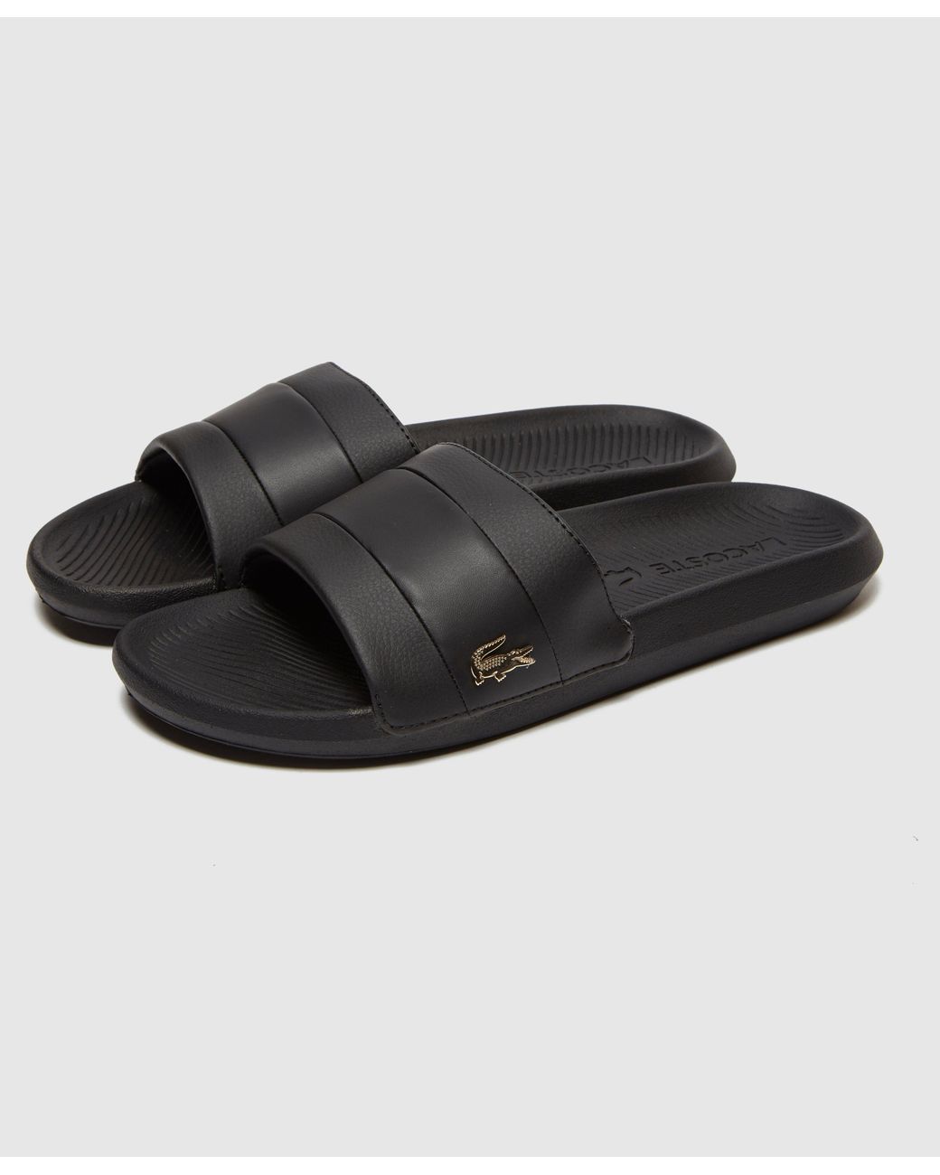 lacoste gold croc sliders in black