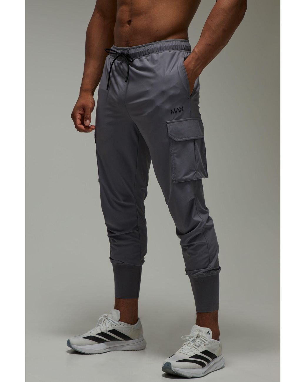 BoohooMAN Black Active Slim Fit Cuffed Cargo Jogger for men