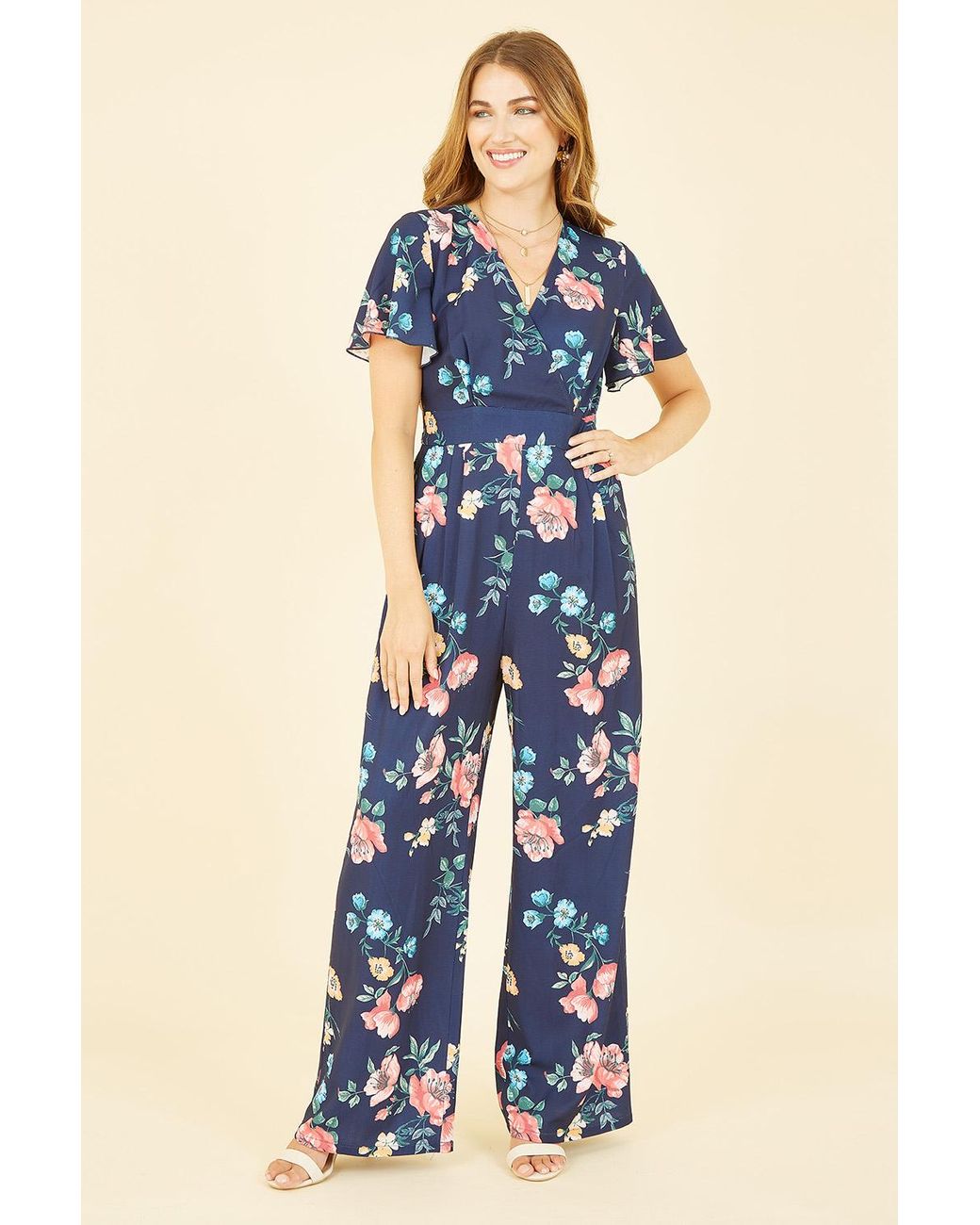 Yumi' Blue Floral Angel Sleeve Jumpsuit