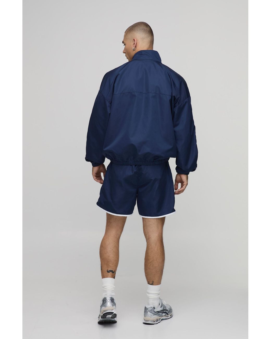 BoohooMAN Blue Boxy Shell Seam Embroidered Funnel Dual Zip Short Tracksuit for men