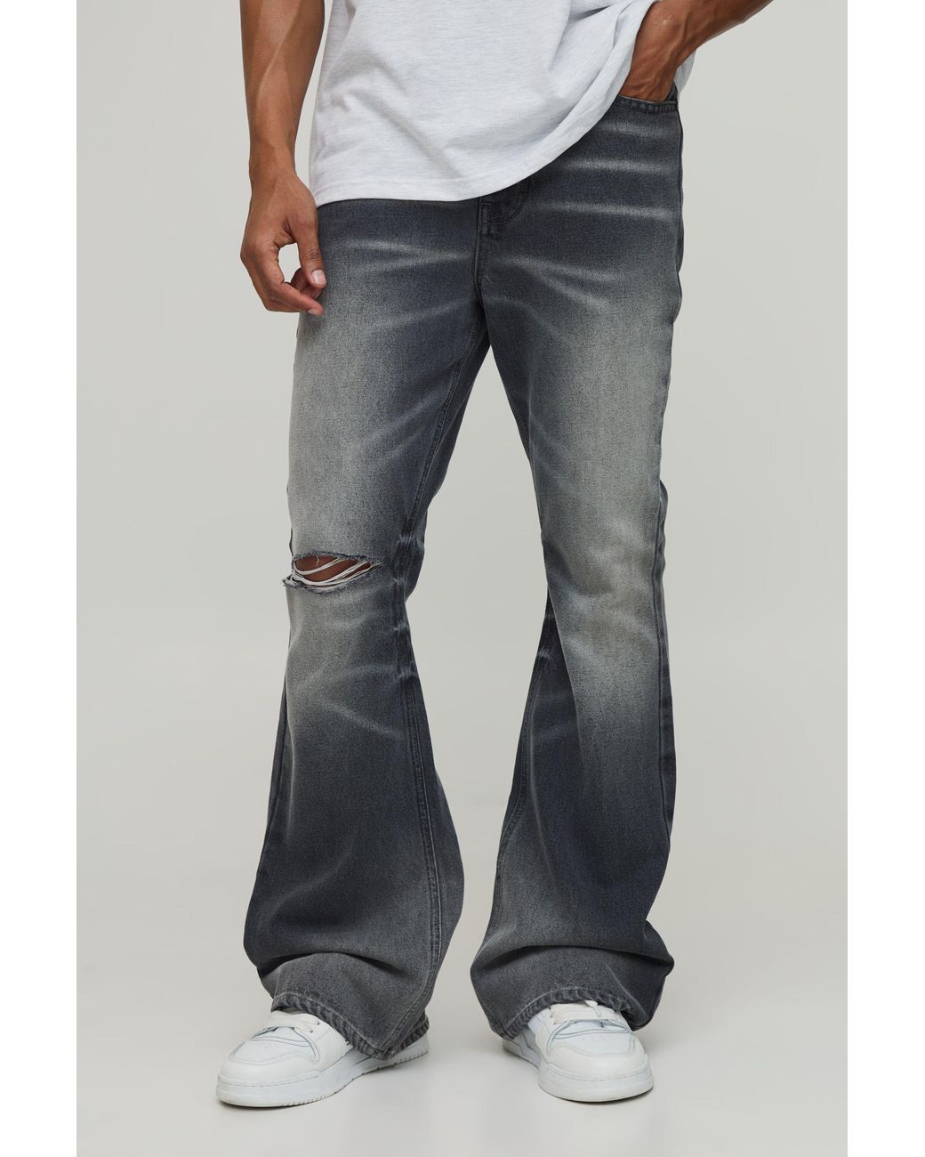BoohooMAN Blue Crease Wash Ripped Knee Flared Jeans for men