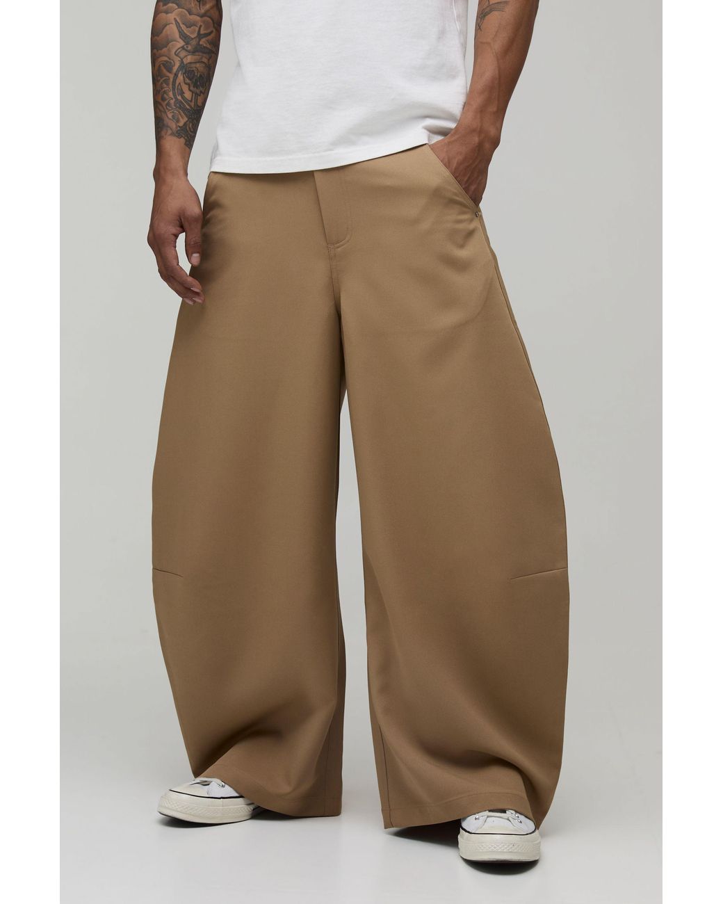 BoohooMAN Brown Extreme Balloon Fit Rivet Trouser for men