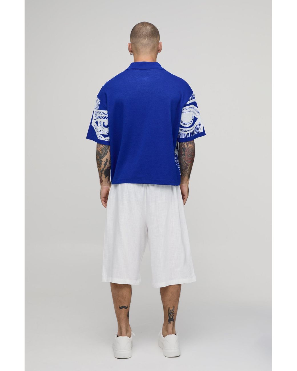 BoohooMAN Blue Oversized Boxy Abstract Face Graphic Knitted Polo for men