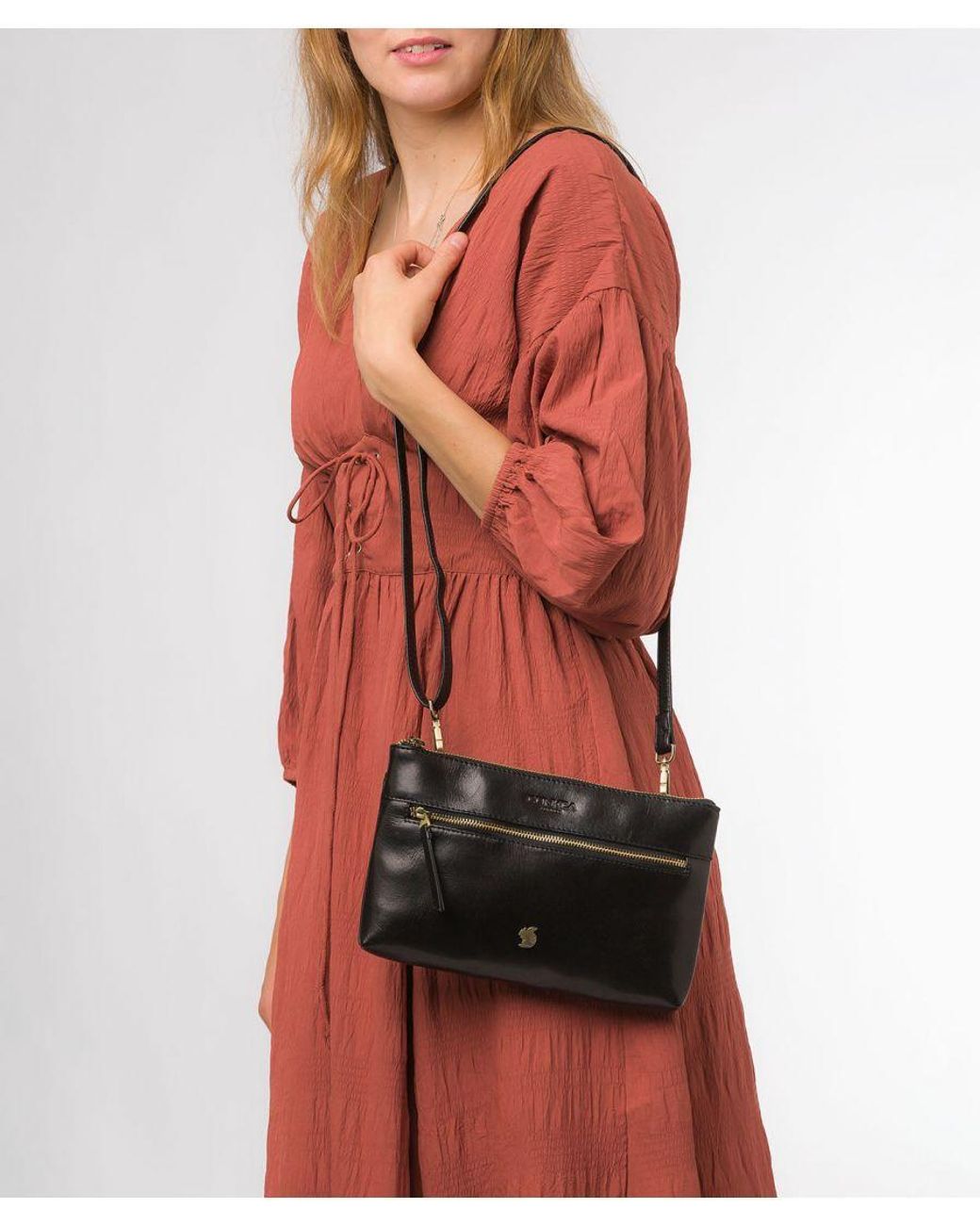 Conkca Black 'Minnow' Leather Cross Body Clutch Bag