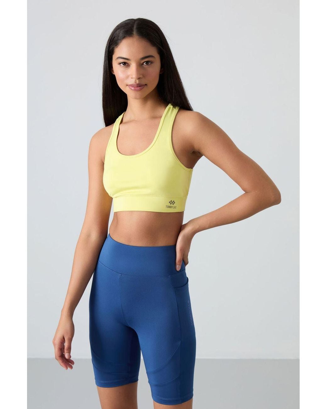 TOMMY LIFE Yellow Sleeveless Cropped Fitted Sports Top