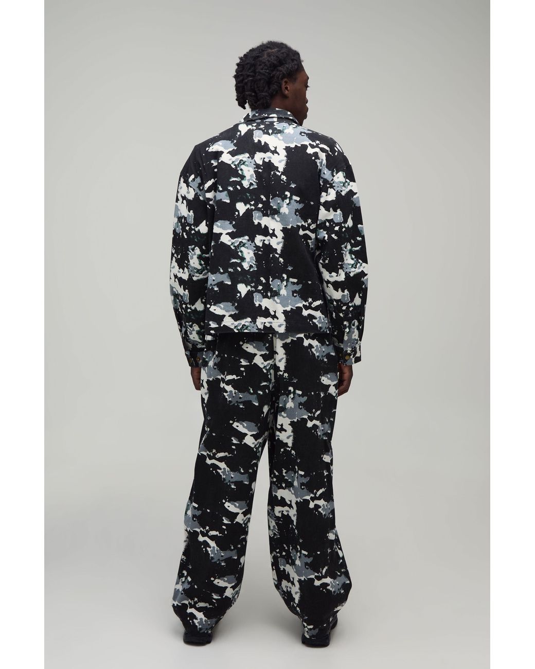 BoohooMAN Black Balloon Fit Distorted Camo Print Twill Trousers for men