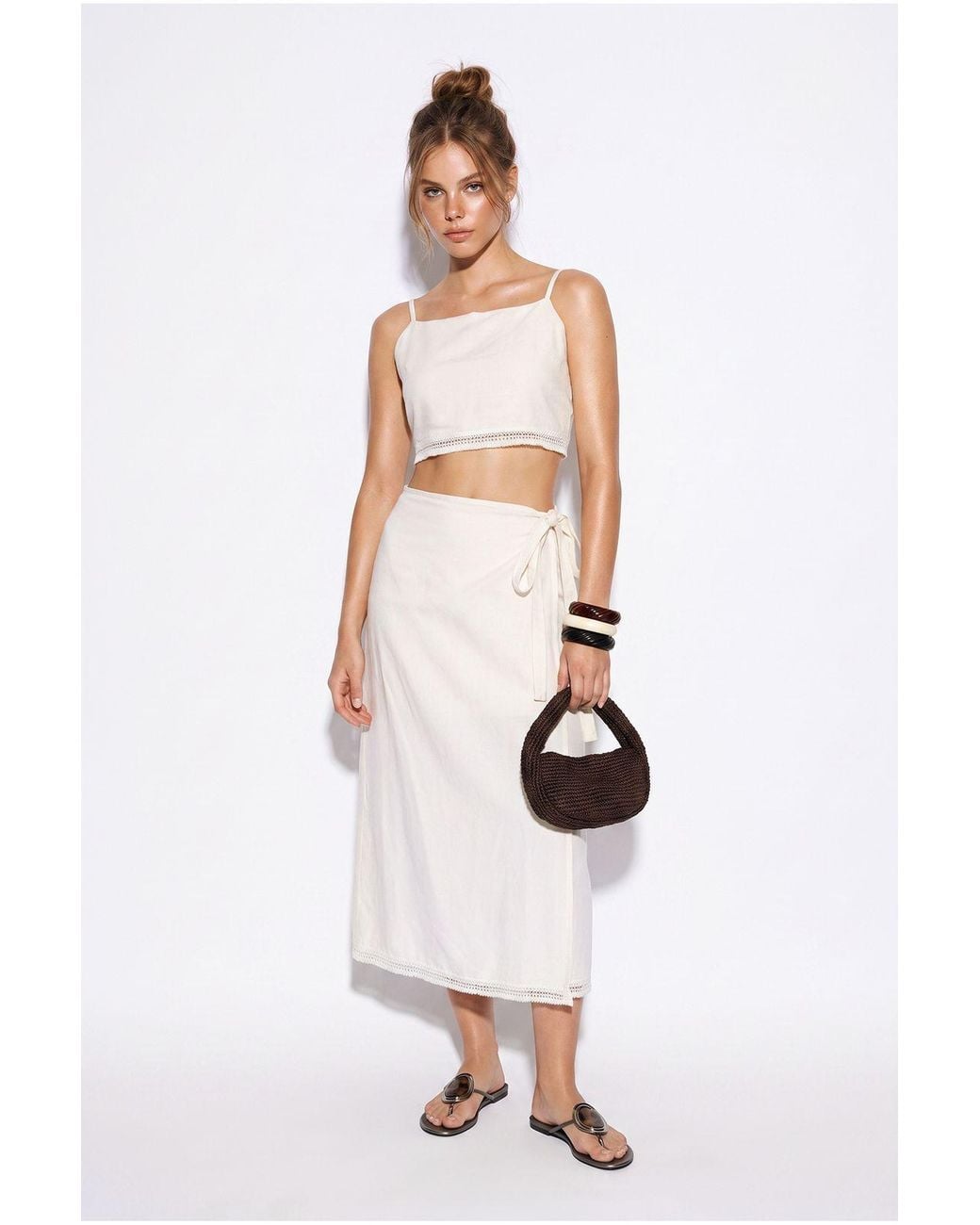 Bianco Lucci White Two-Piece Viscose Cotton Blouse And Skirt Set