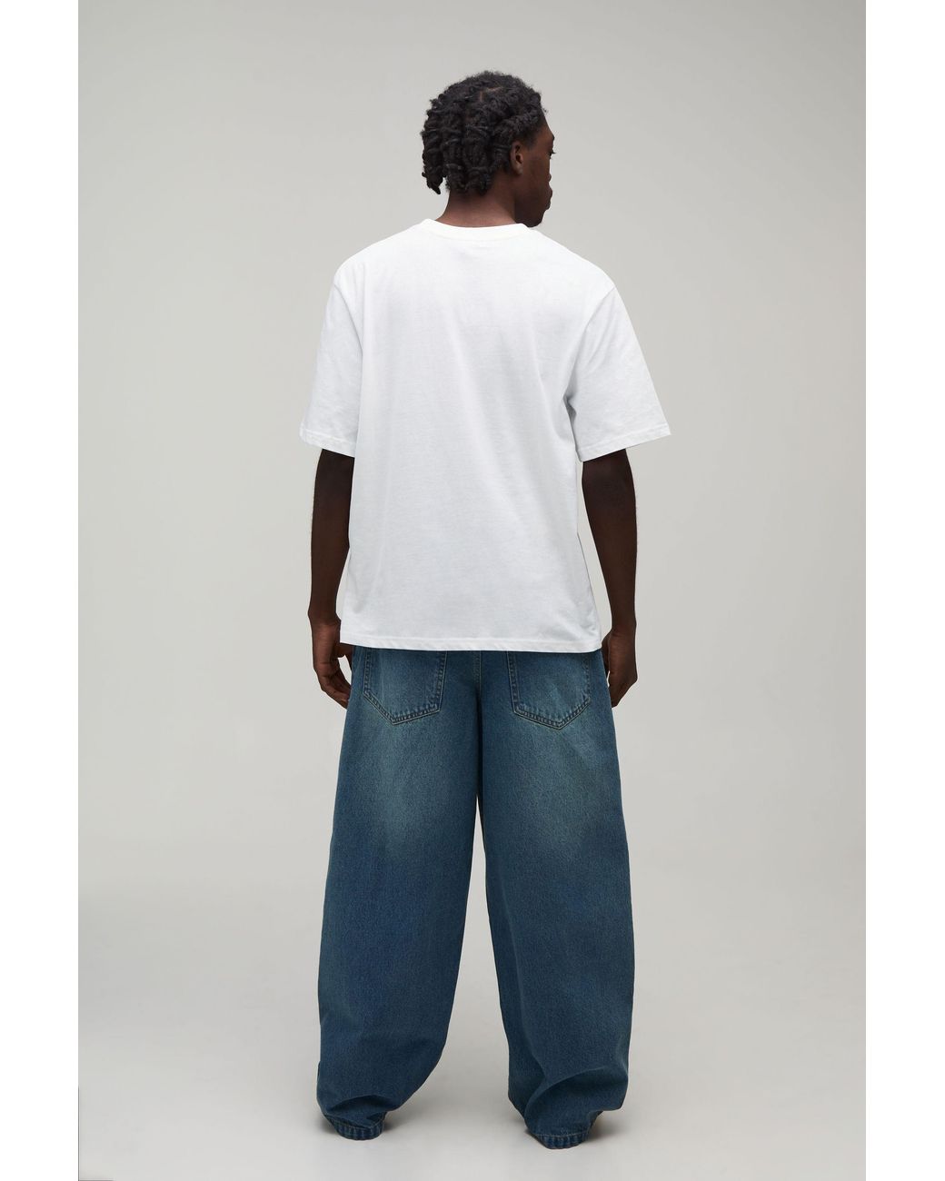 BoohooMAN Blue Antique Wash Graffiti Print Super Baggy Jeans for men
