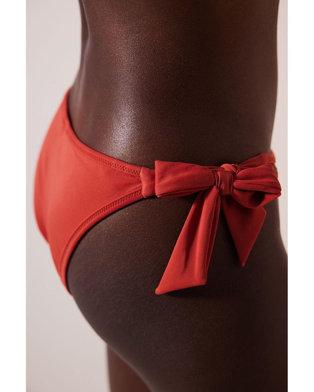 Penti Red Low-Waist Brazilian Bikini Bottoms With Bow Detail