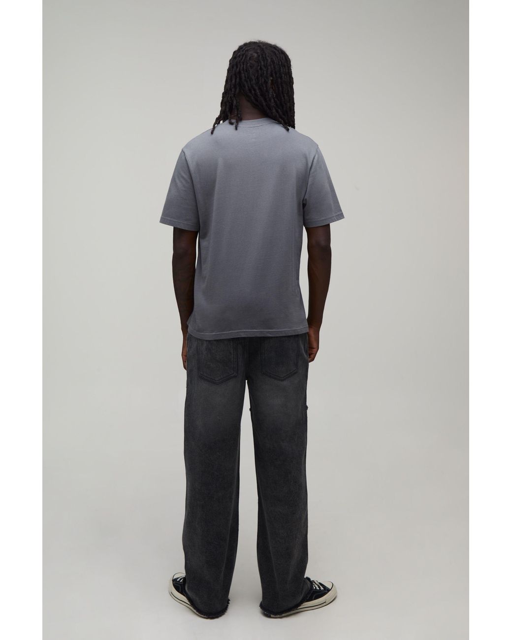 BoohooMAN Black Star Cut & Sew Relaxed Fit Jeans for men