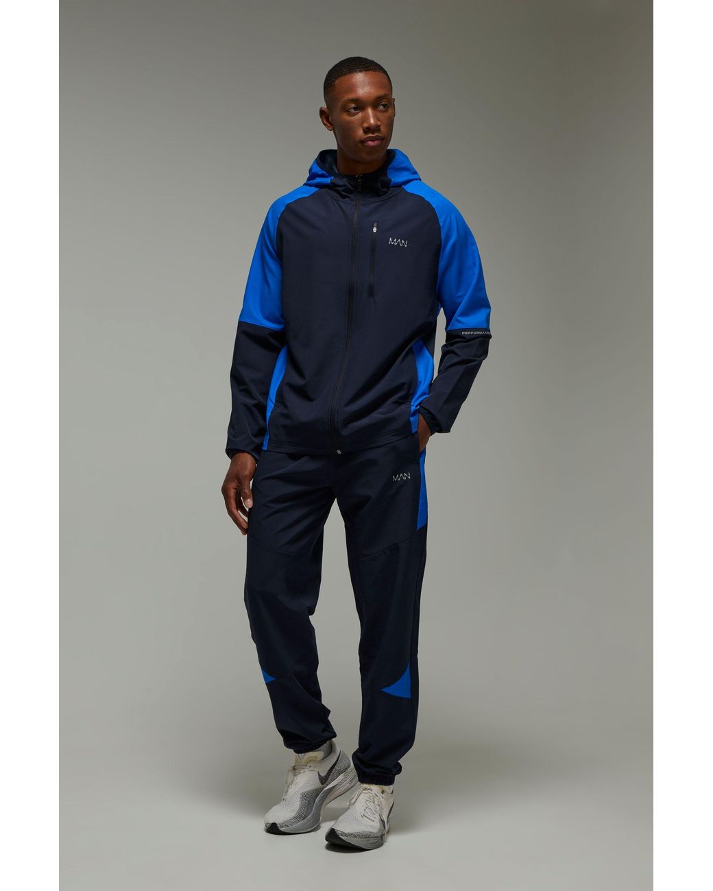 BoohooMAN Blue Active Colour Block Stretch Woven Regular Fit Tracksuit for men