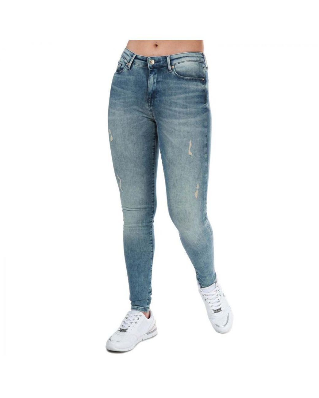 Tommy Hilfiger Como Heritage Faded Skinny Fit Jeans in het Blauw | Lyst NL