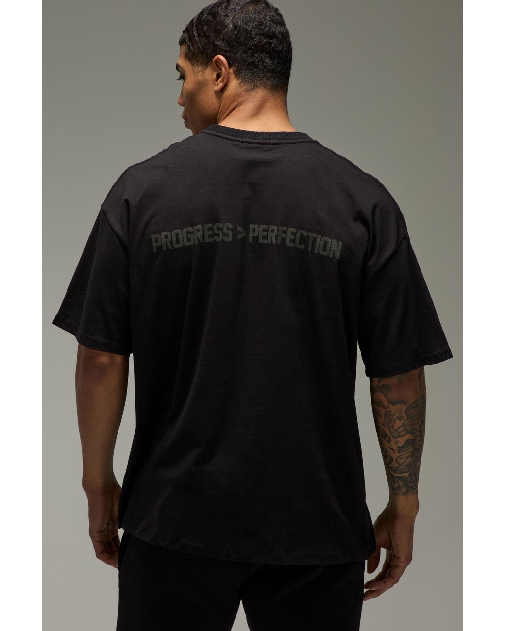 BoohooMAN Black Active Progress Over Perfection Oversized T-Shirt for men