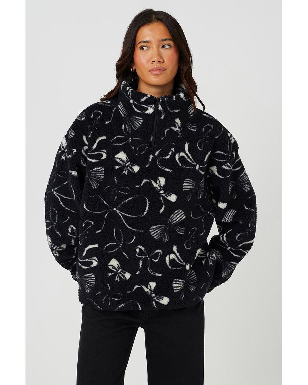 Brave Soul Black Bow Print Sherpa Fleece Sweatshirt