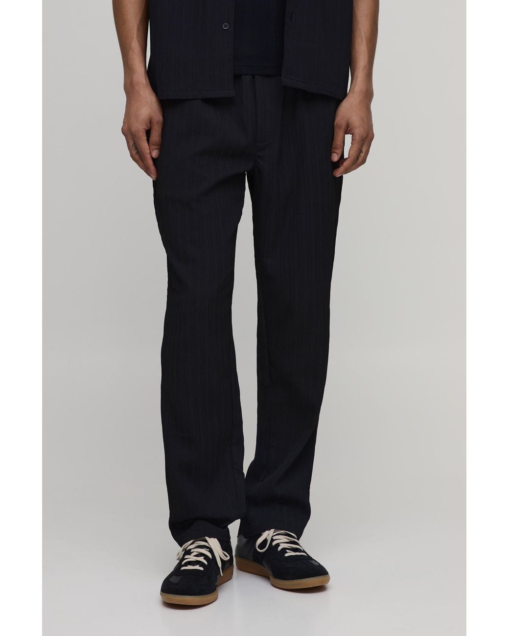 BoohooMAN Black Tapered Fit Irregular Pleat Texture Trousers for men
