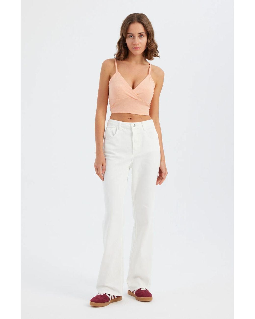 Hiccup White Sleeveless V-Neck Basic Top
